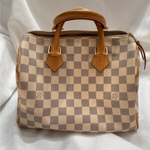 Classic Louis Vuitton Speedy 25 - Damier Azur coated canvas with vanchetta trim.